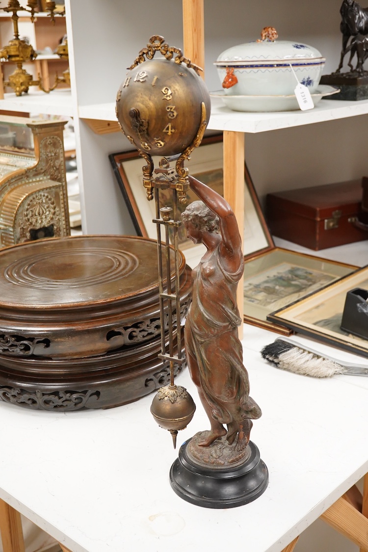 A late 19th century spelter figural mystery clock, 63cm high